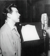 Recording one of his radio shows, 1952